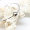 Bracelet perle de Tahiti ronde ø 7-8 mm et hématites