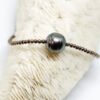 Collier ras le cou réglable, perle de Tahiti baroque et hématites