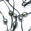 Pompom perles de Tahiti et cuir de kangourou