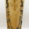Double sautoir en cuir orné de 47 perles de Tahiti baroques