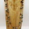 Double sautoir en cuir orné de 47 perles de Tahiti baroques